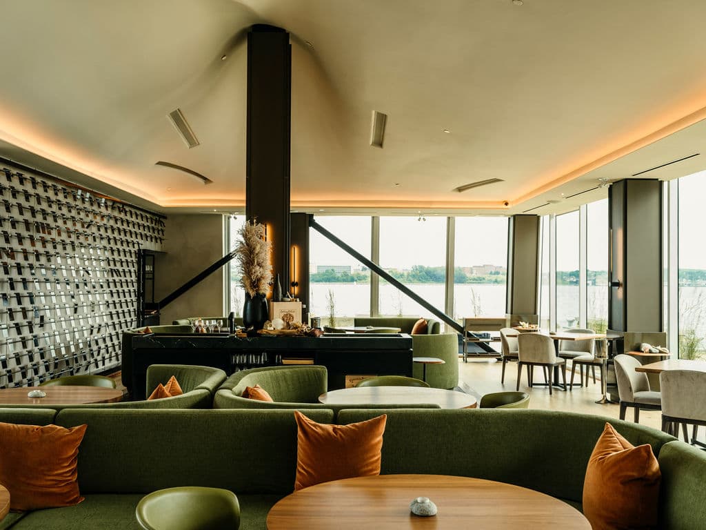 The spacious modern dining room at Mystic overlooking the harbor in Halifax.